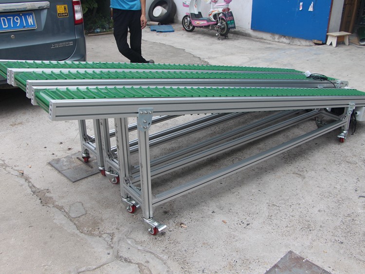 皮帶面加橫向?qū)l小型皮帶輸送機